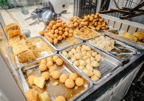 Explore a vibrant array of traditional Indonesian street snacks in Jakarta.