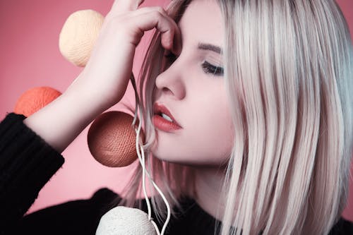 Woman Holding Knitted Ball String