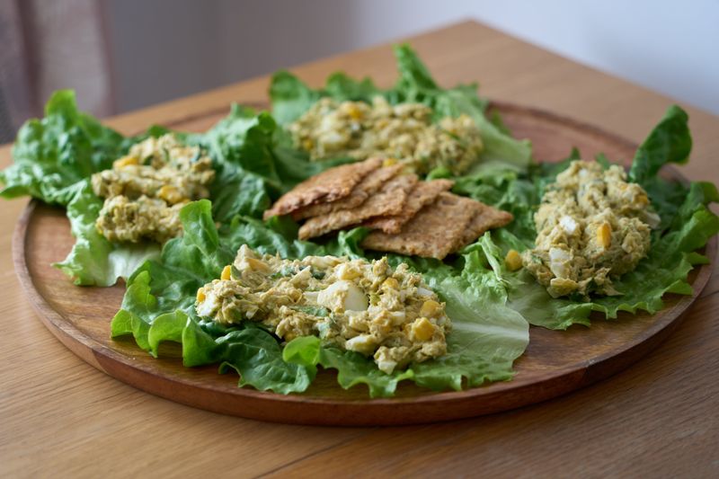 egg salad served in crisp lettuce leaves