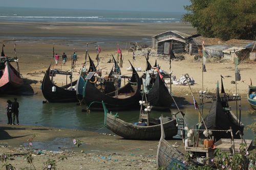 Free Rustic wooden boats by the shore, showcasing local fishing culture. Stock Photo