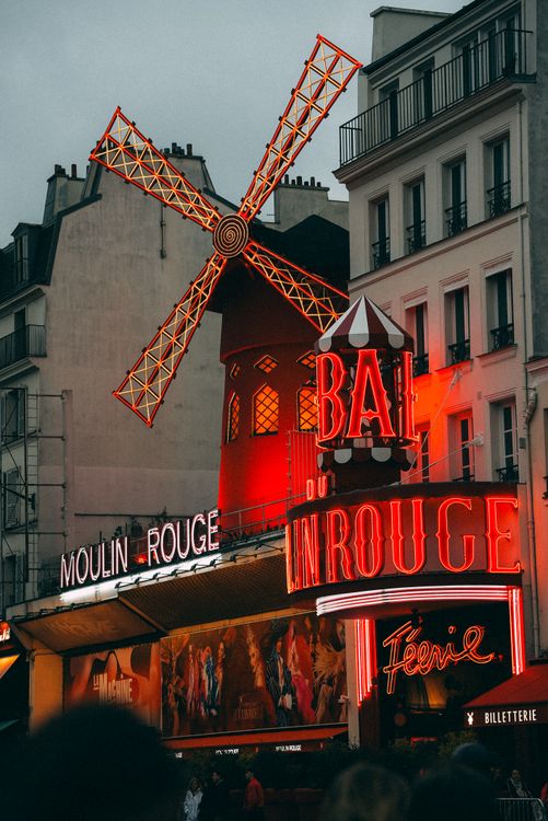 Iconic View of Moulin Rouge in Paris at Night · Free Stock Photo