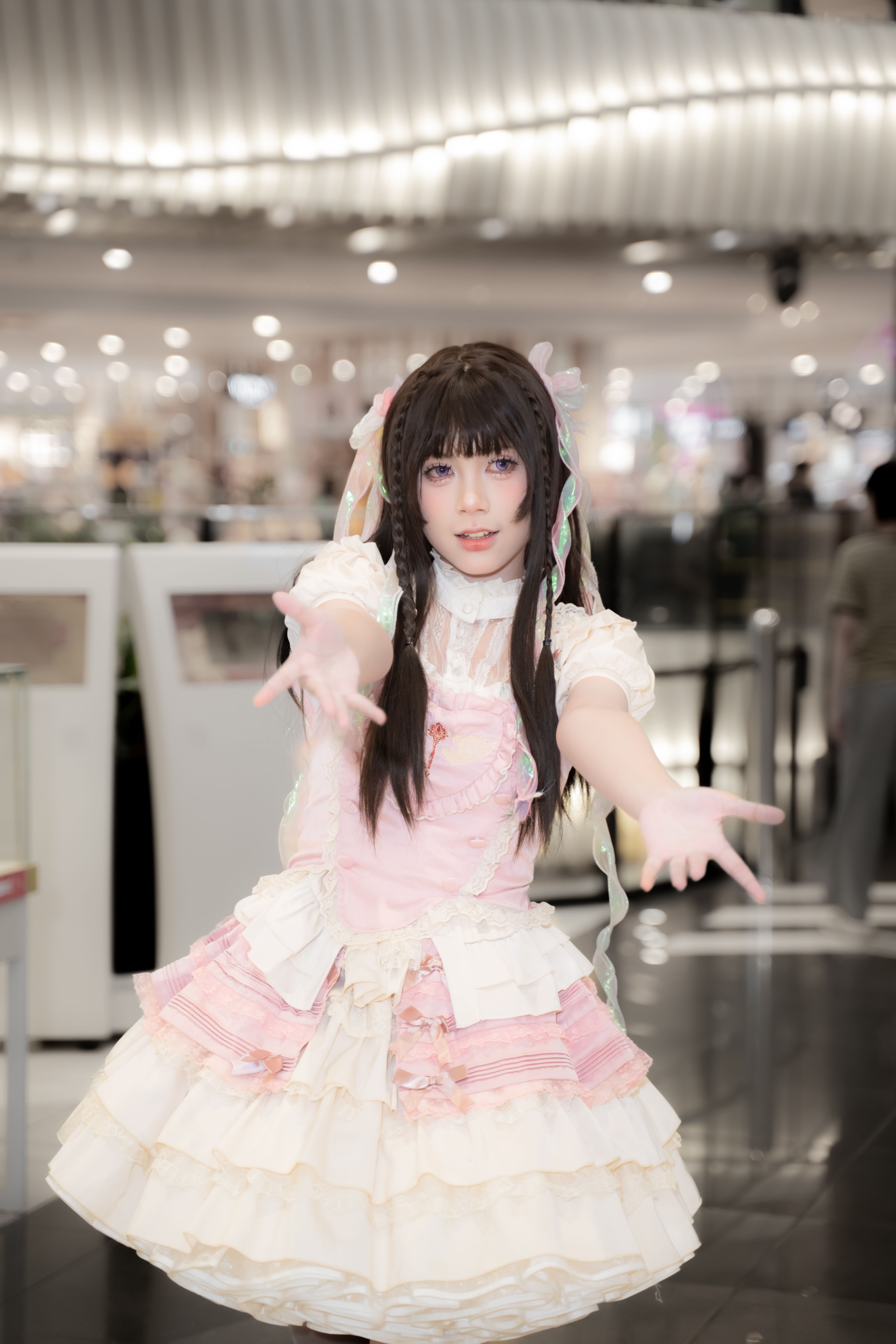 Cosplayer in Cute Lolita Fashion Outfit Indoors · Free Stock Photo