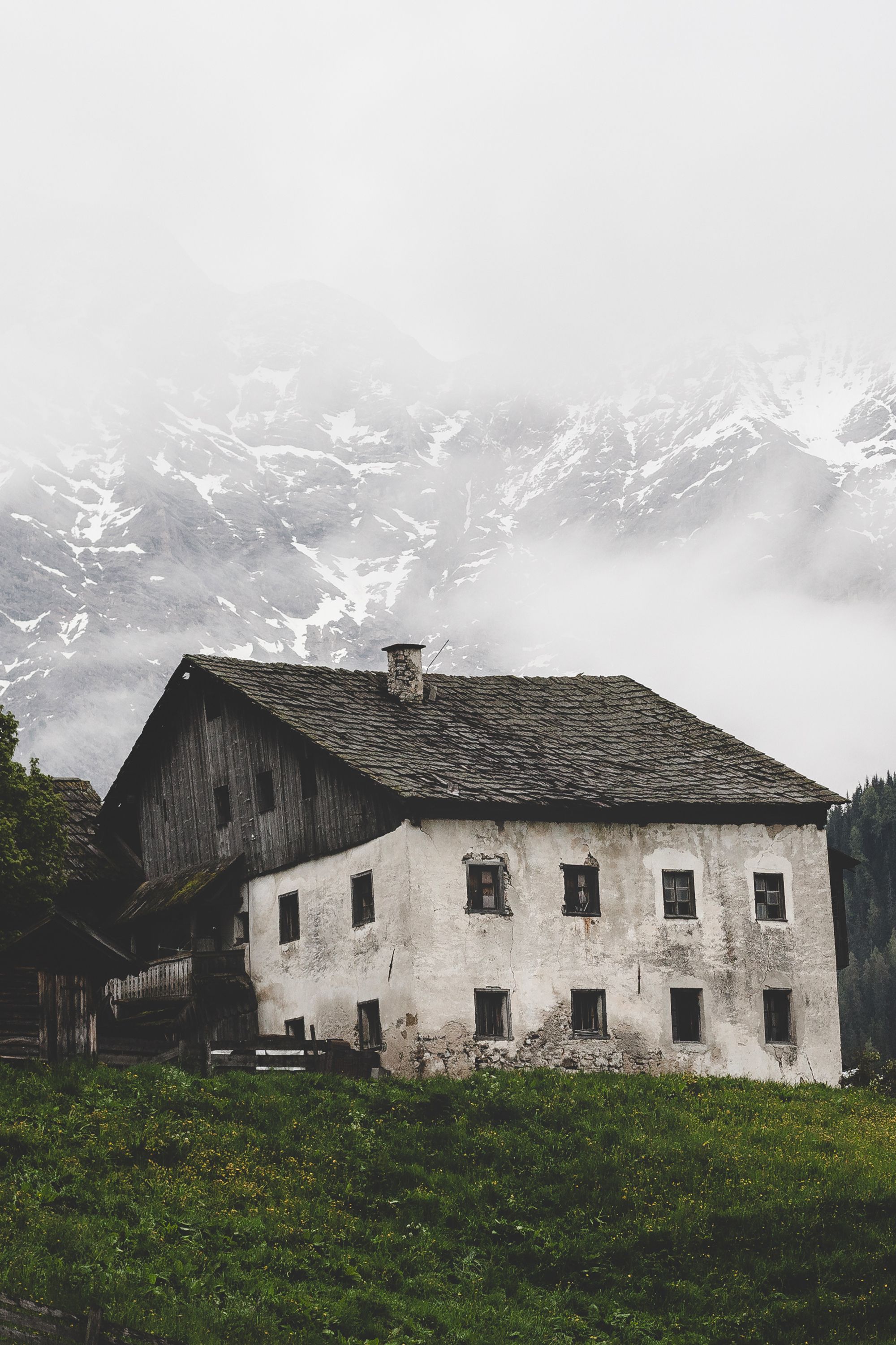 Rustic Alpine House in Misty Mountain Landscape · Free Stock Photo