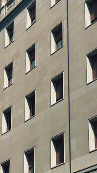 Geometric window design on a building facade in Barcelona, Spain.