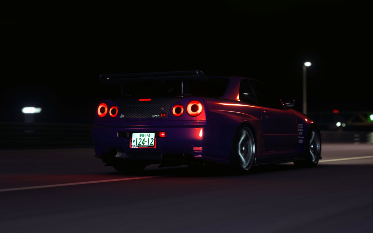 Midnight Driving in Toyotomi: A Nissan R34 at Night · Free Stock Photo