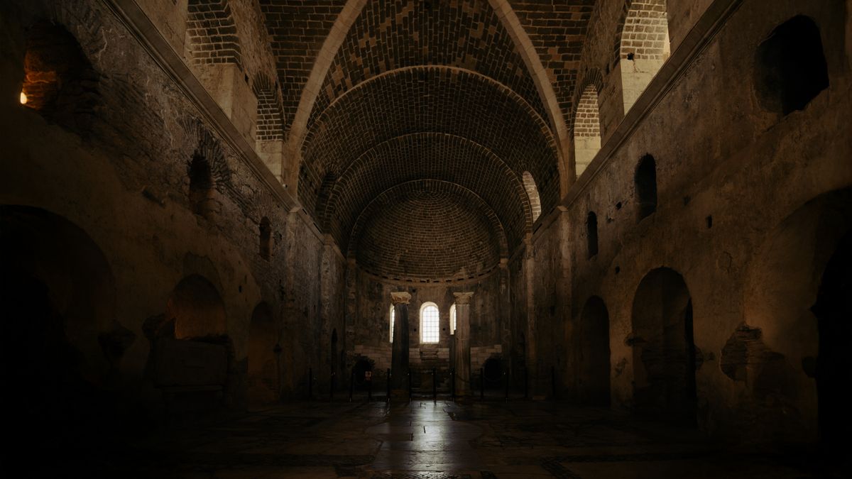 X JAPAN I'll Kill You——Dark interior of an ancient cathedral featuring intricate arched ceilings and stone walls.