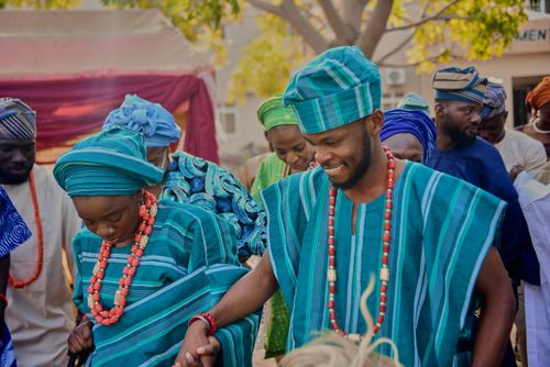 Free Joyful African wedding ceremony featuring colorful traditional attire and cultural celebration. Stock Photo