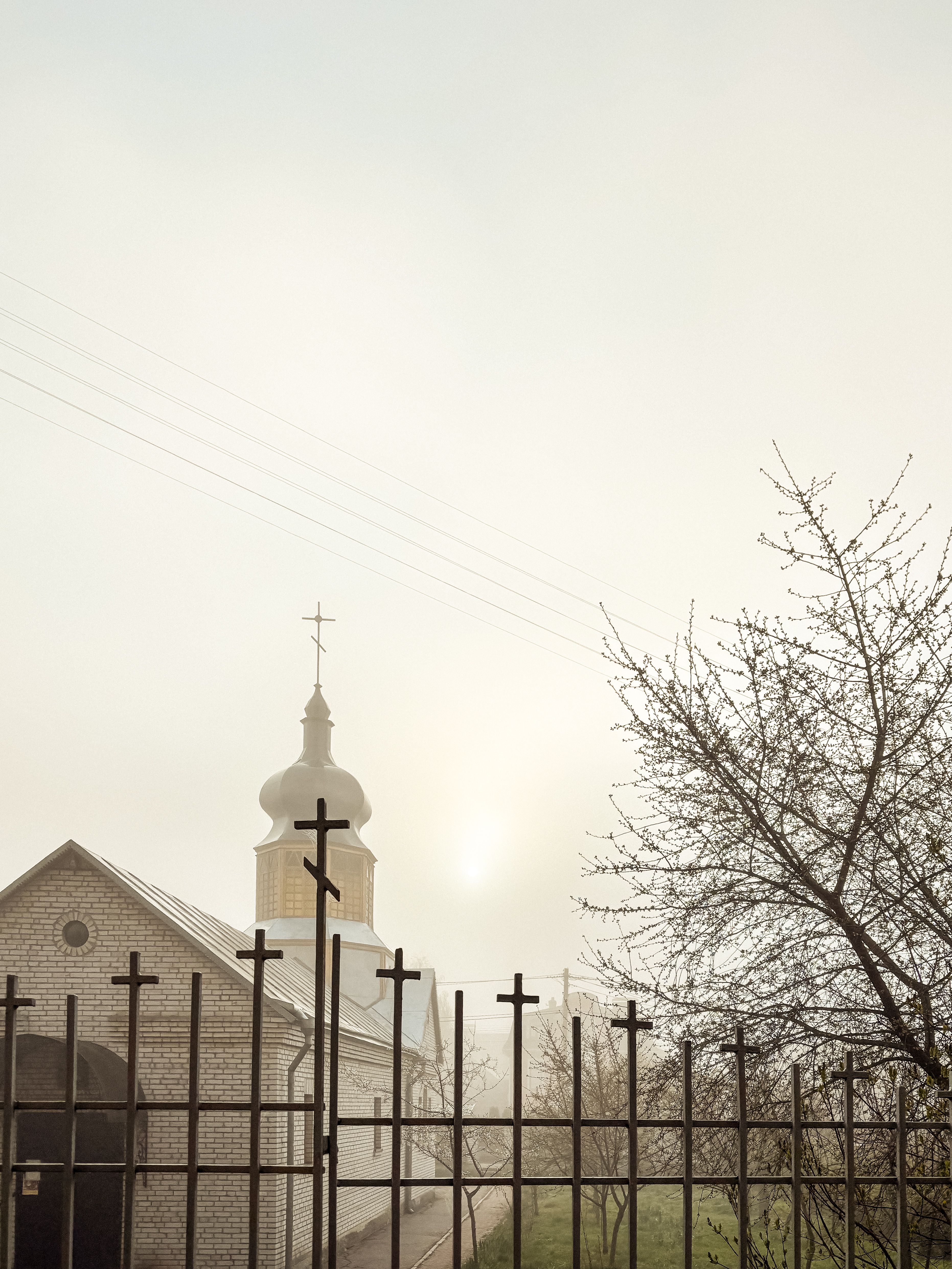 Serene Misty Morning at a Rural Church · Free Stock Photo