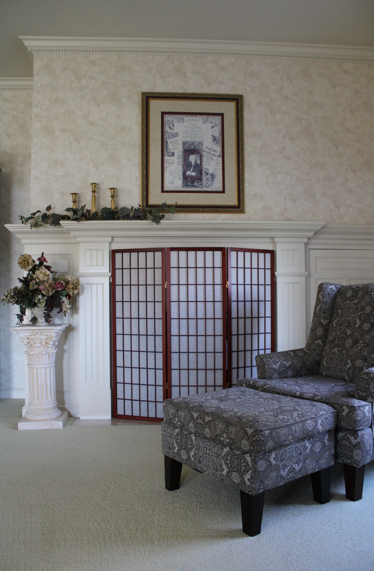 Living room with custom fireplace surround and mantel