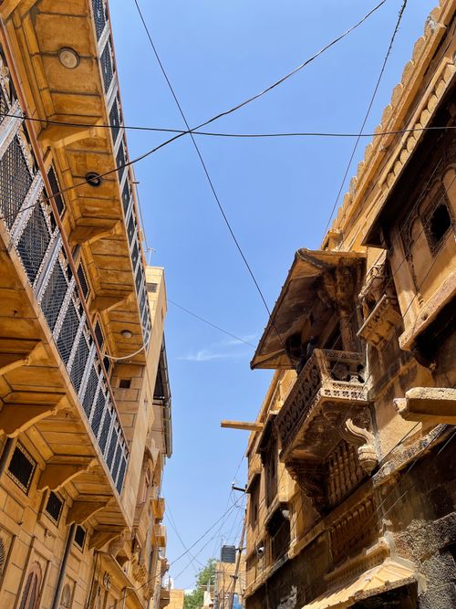 Free Intricate carving and sandstone structures in Jaisalmer under blue sky. Stock Photo