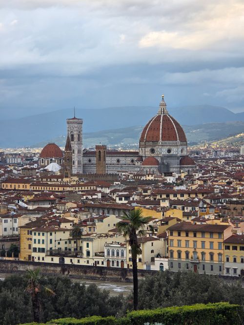 Free A stunning view of Florence, Italy, showcasing the iconic Florence Cathedral with its majestic dome. Stock Photo