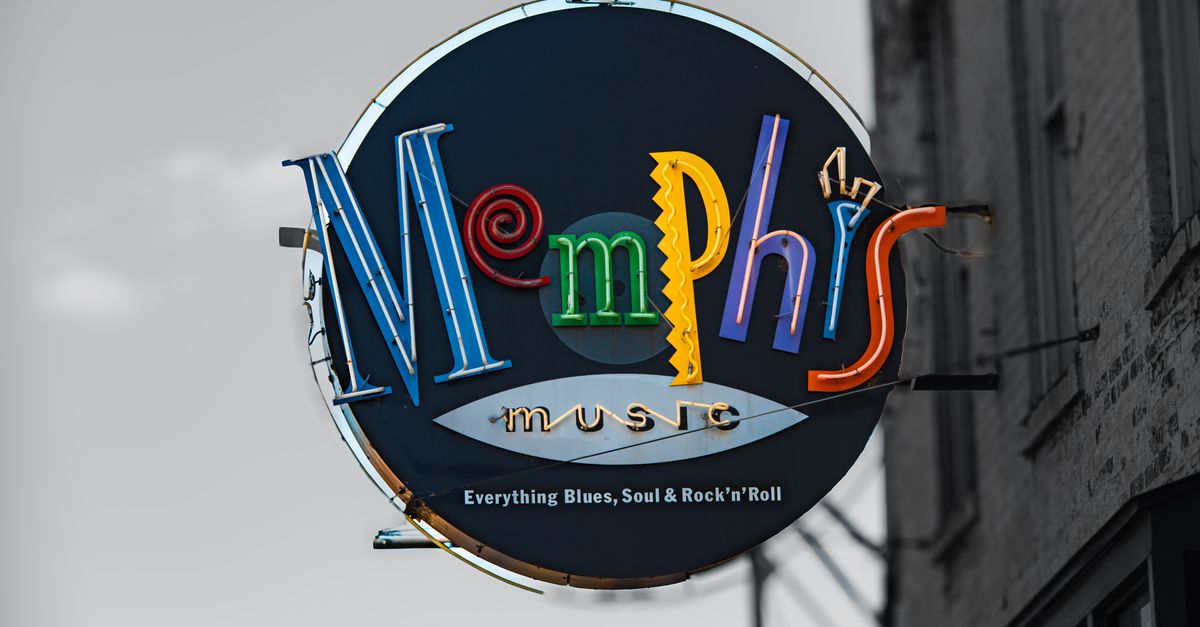 Vibrant neon sign for Memphis Music on Beale Street, highlighting blues and rock'n'roll heritage.