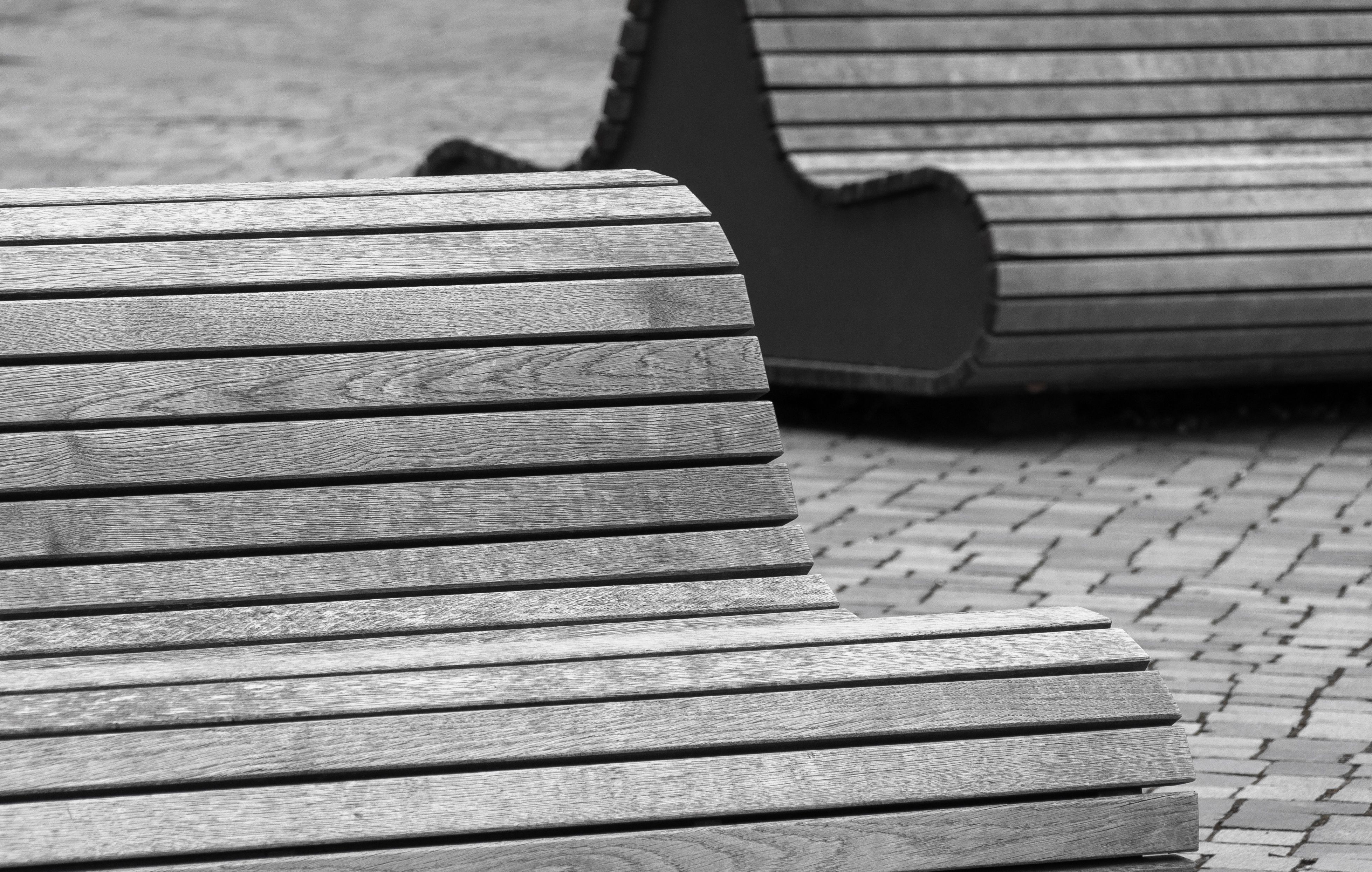Abstract Wooden Benches in Urban Setting · Free Stock Photo