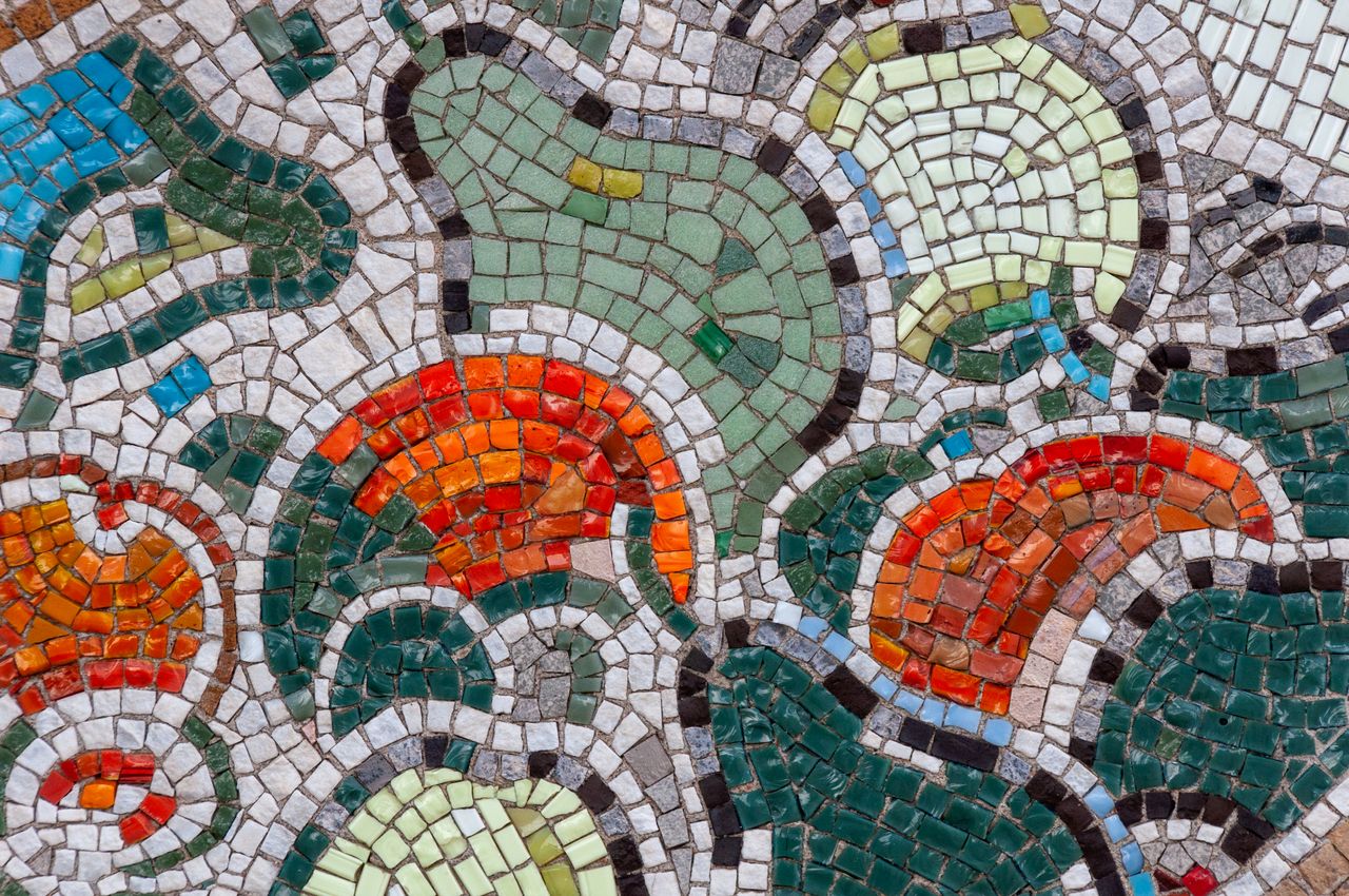 vibrant mosaic artwork featuring an abstract geometric design in multi
