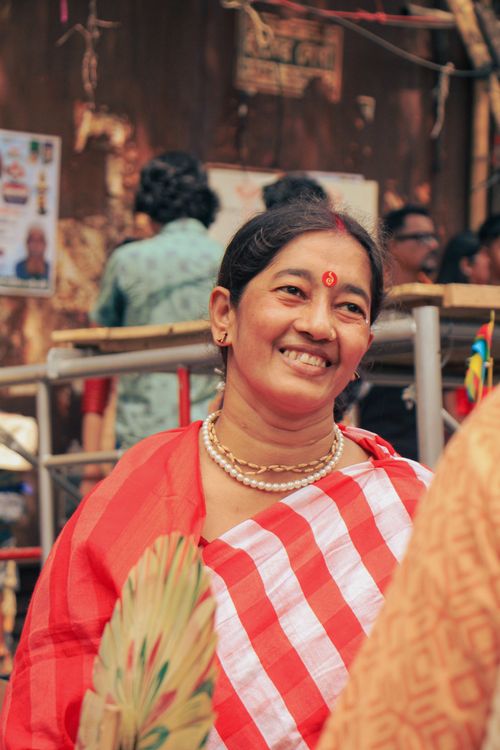 Free A woman in traditional attire smiling during Pohela Boishakh celebrations in Dhaka, Bangladesh. Stock Photo