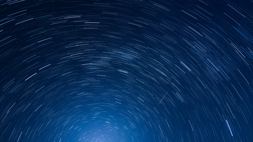 Free Long exposure capture of mesmerizing star trails creating circular patterns in Sydney, Australia night sky. Stock Photo