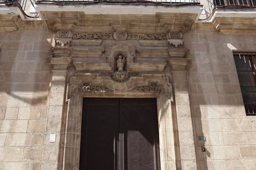 Free Historic stone doorway with intricate carvings in El Puerto de Santa María, Spain. Stock Photo