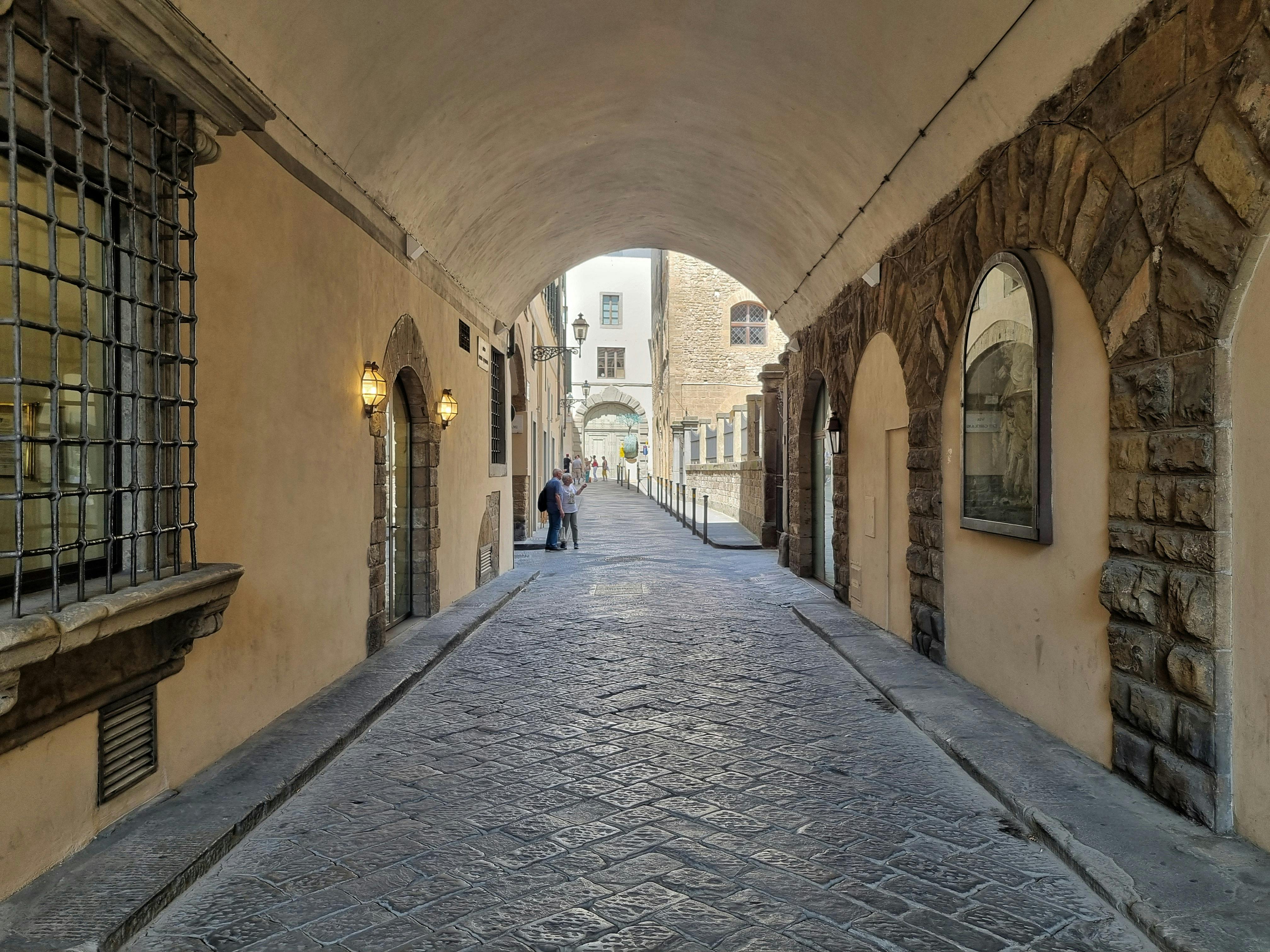 Quiet Florentine cobblestone alley — hidden gems away from the crowds.