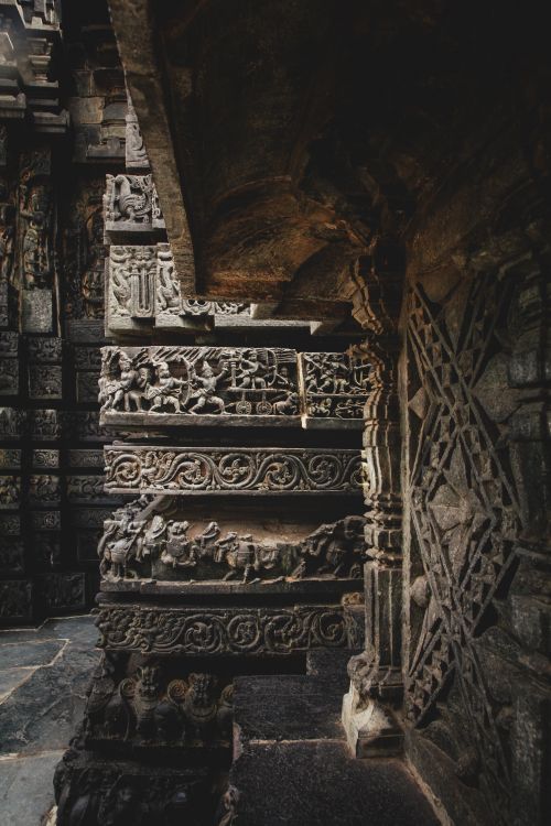 Free Close-up of detailed stone carvings showcasing ancient temple architecture's intricate beauty. Stock Photo