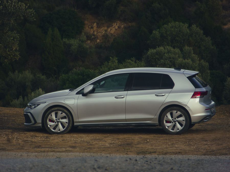 Silver hatchback parked outdoors near green hillside — photo by Ayoub Benamor on Pexels