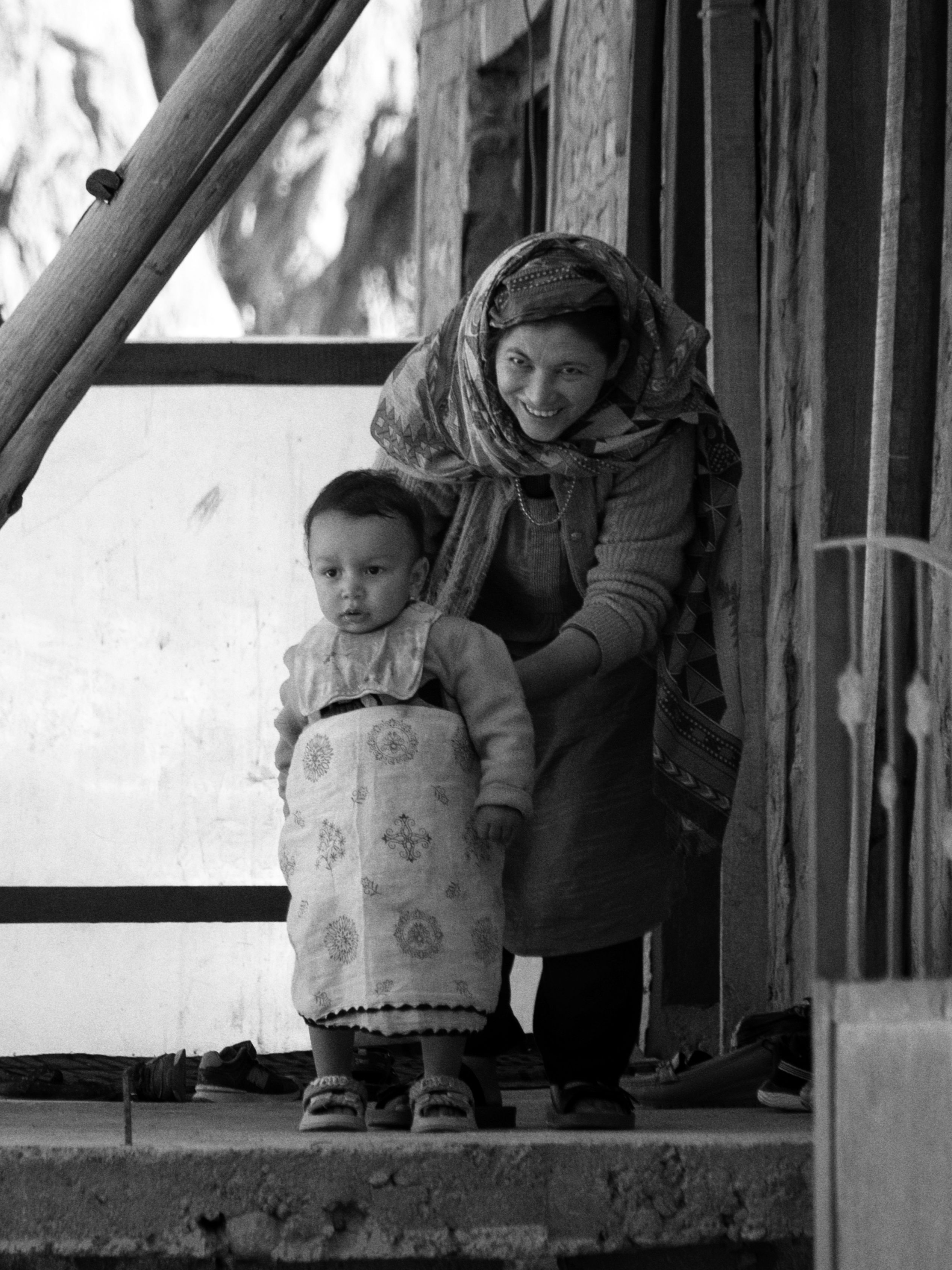 Mother and Child Portrait in Rustic Setting · Free Stock Photo
