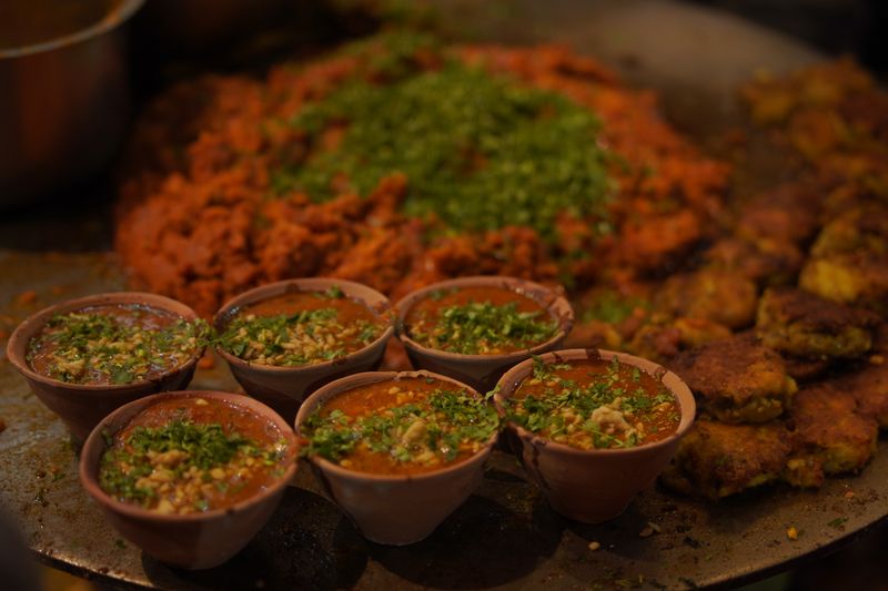 Rustic Bihar Litti Chokha being roasted over coals