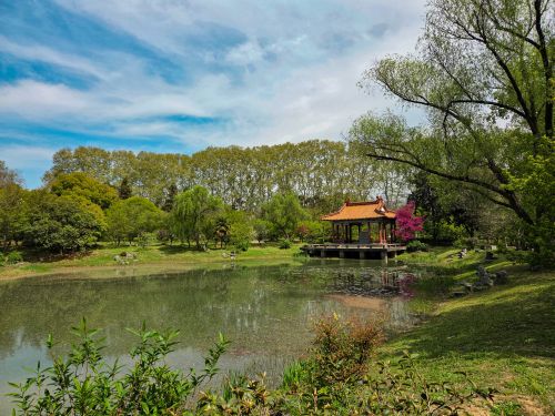 Free Serene landscape of a traditional Chinese garden in Nanjing with a picturesque pavilion by a pond. Stock Photo