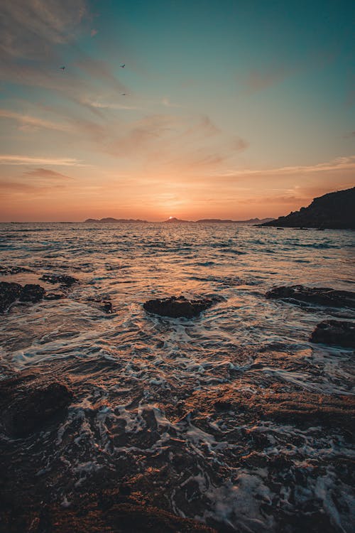 Free Body of Water during Sunset Stock Photo