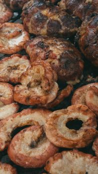 Close-up of assorted grilled meats sizzling on a barbecue, showcasing traditional Argentine asado.