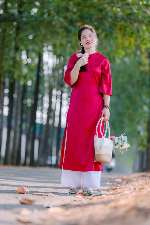 Young Woman in Traditional Red Dress Outdoors · Free Stock Photo