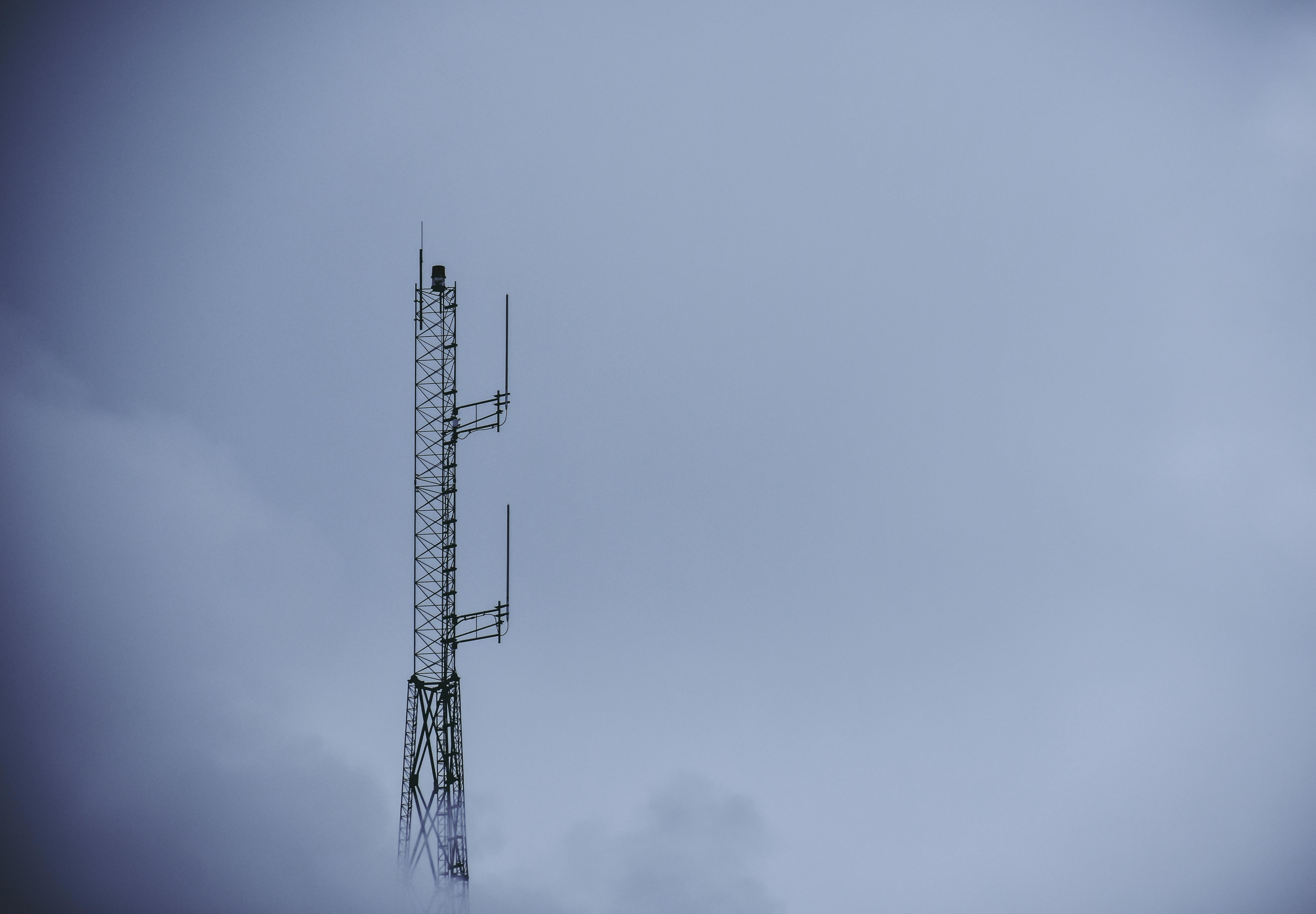 Black Metal Tower Under Gray Sky \u00b7 Free Stock Photo