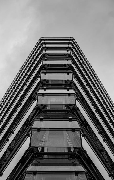 Gray scale Low Angle Photography of Concrete Building