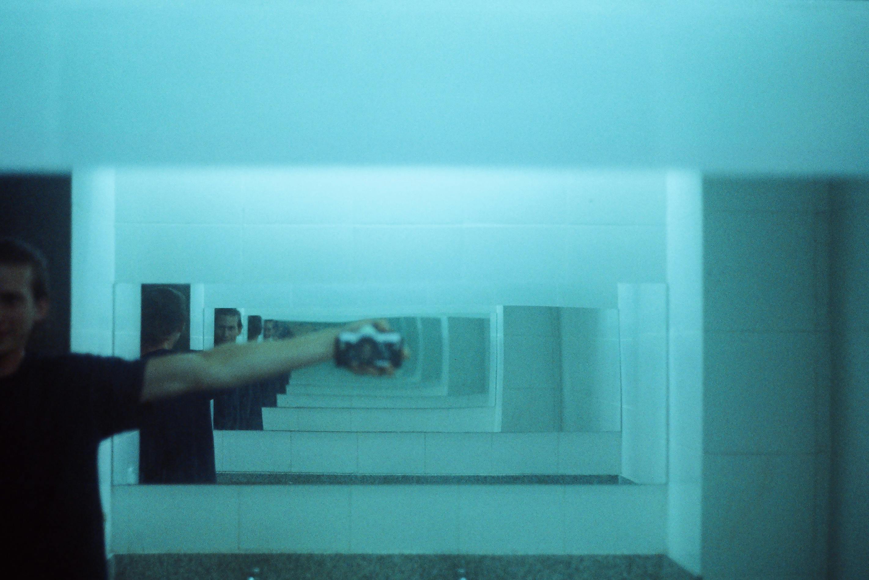 Man Taking Photo Of Himself At The Mirror · Free Stock Photo