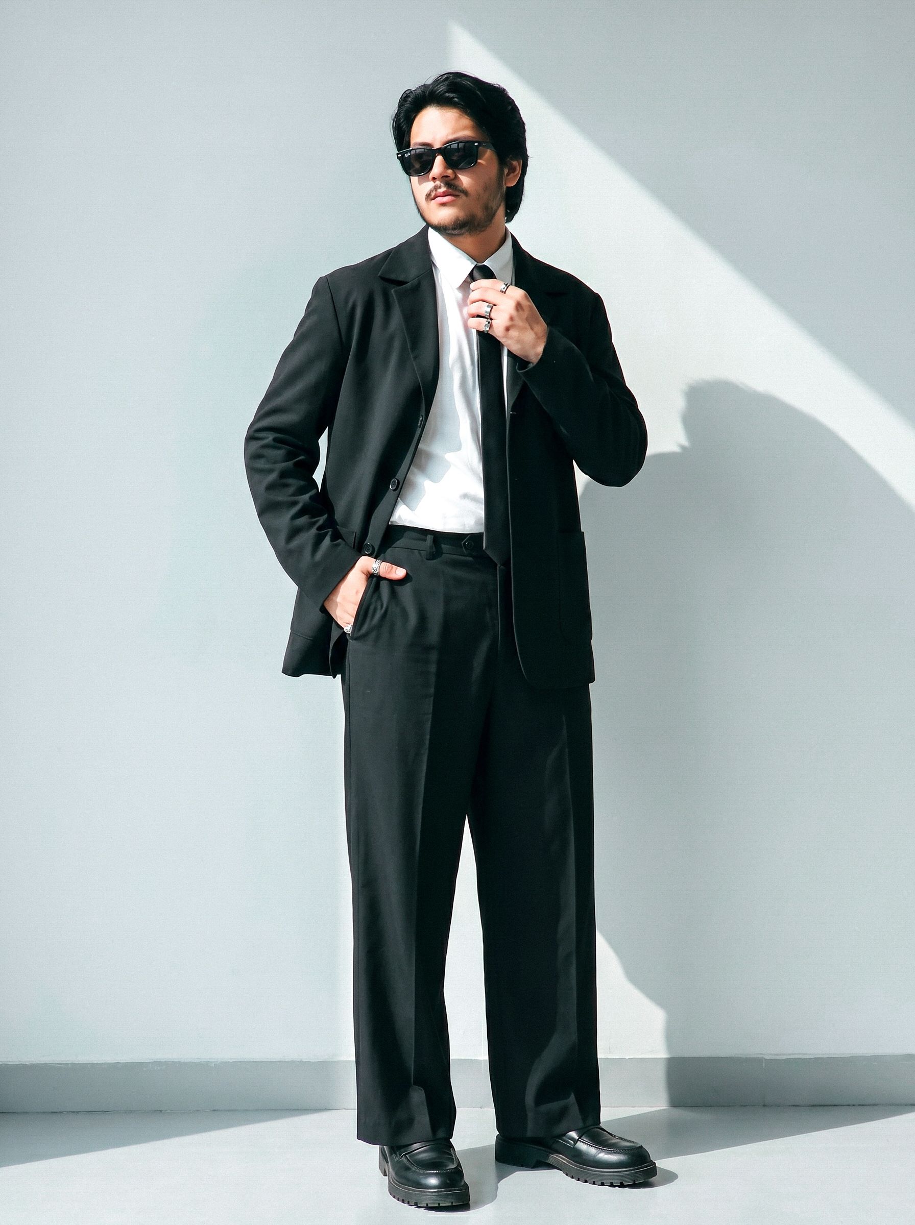 Stylish Man in Black Suit with Sunglasses · Free Stock Photo