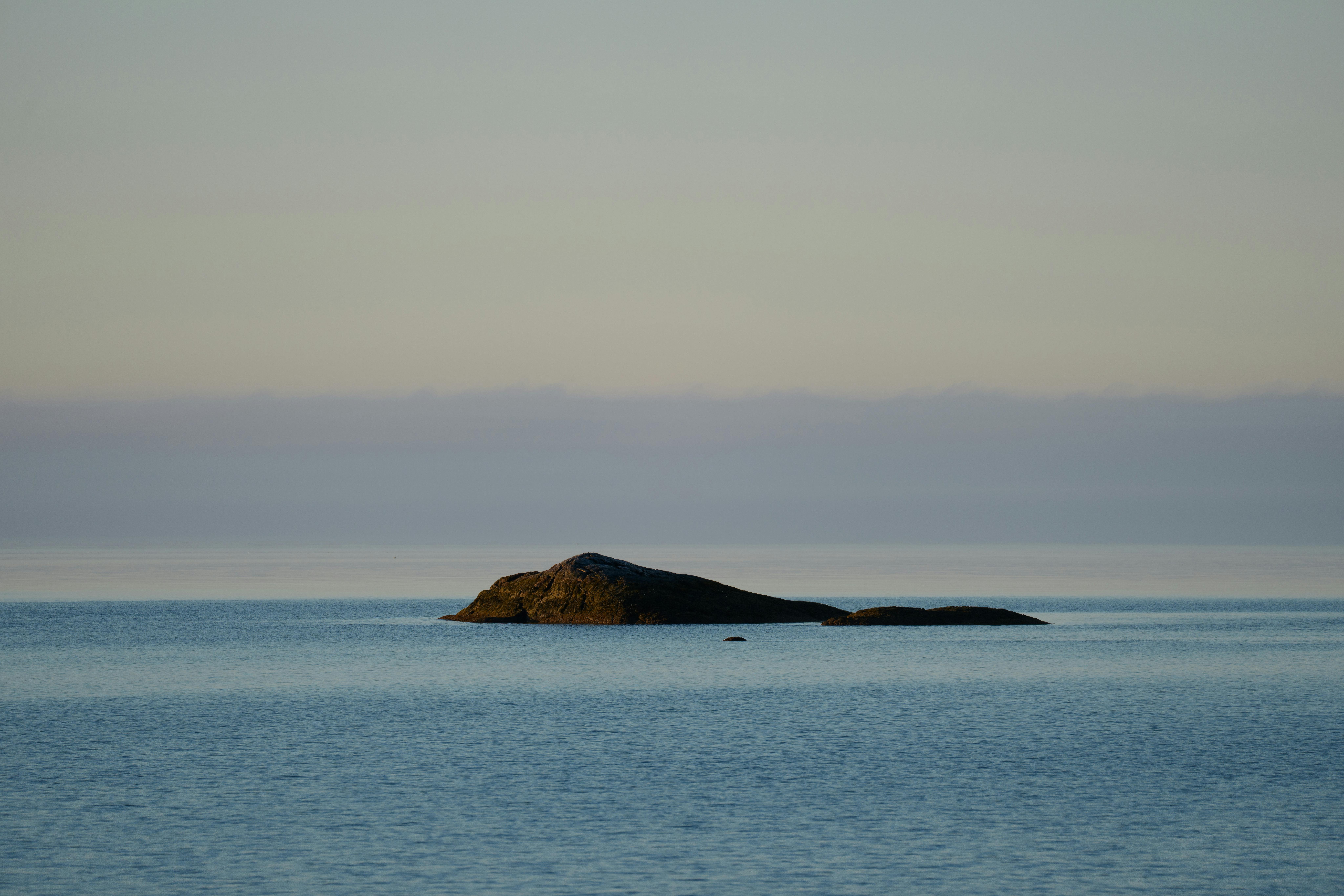 A tranquil small island in serene water captured at dawn, Stamford, Connecticut.