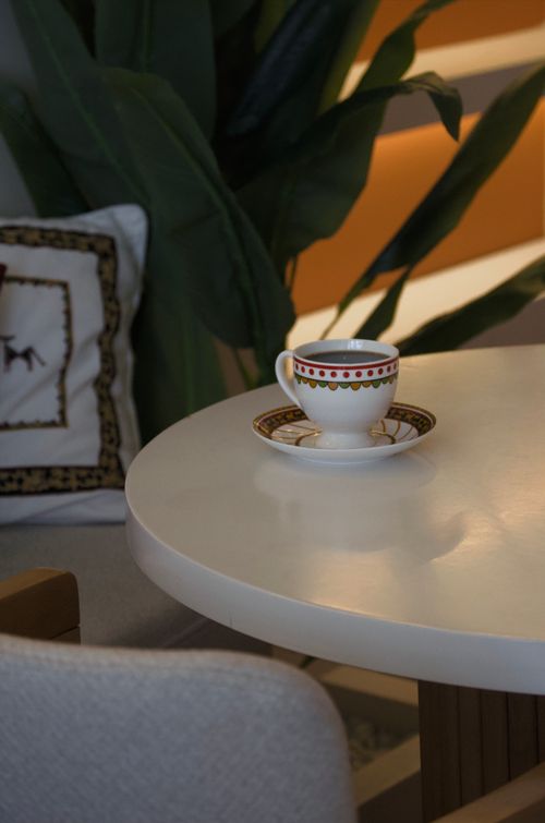Free A stylish coffee cup on a modern table setting in a cozy Turkish cafe ambiance. Stock Photo