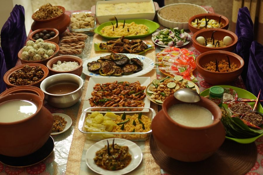 A vibrant spread of traditional South Indian vegetarian dishes displayed on a festive table.