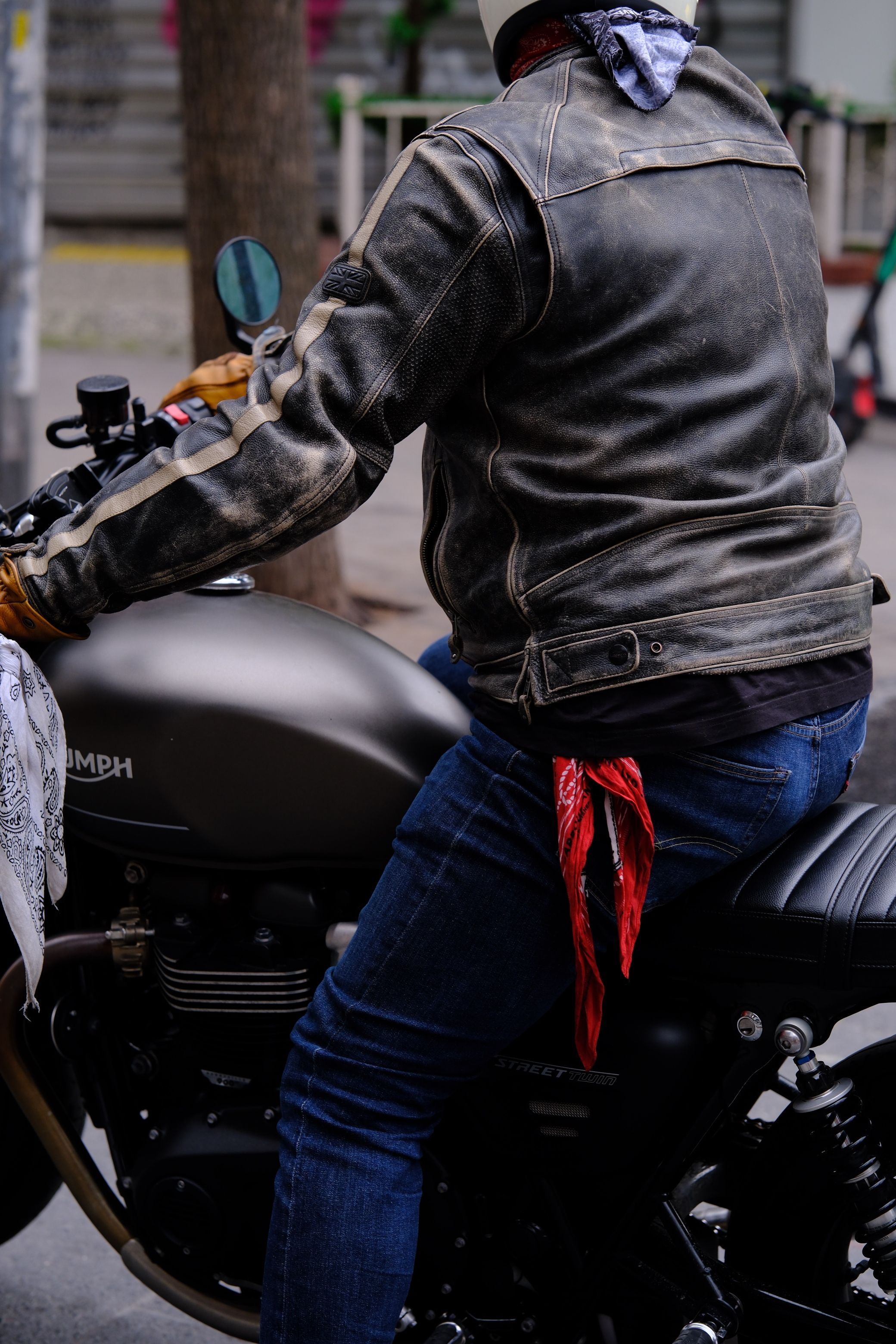 Person with Buff Sitting on Motorbike · Free Stock Photo