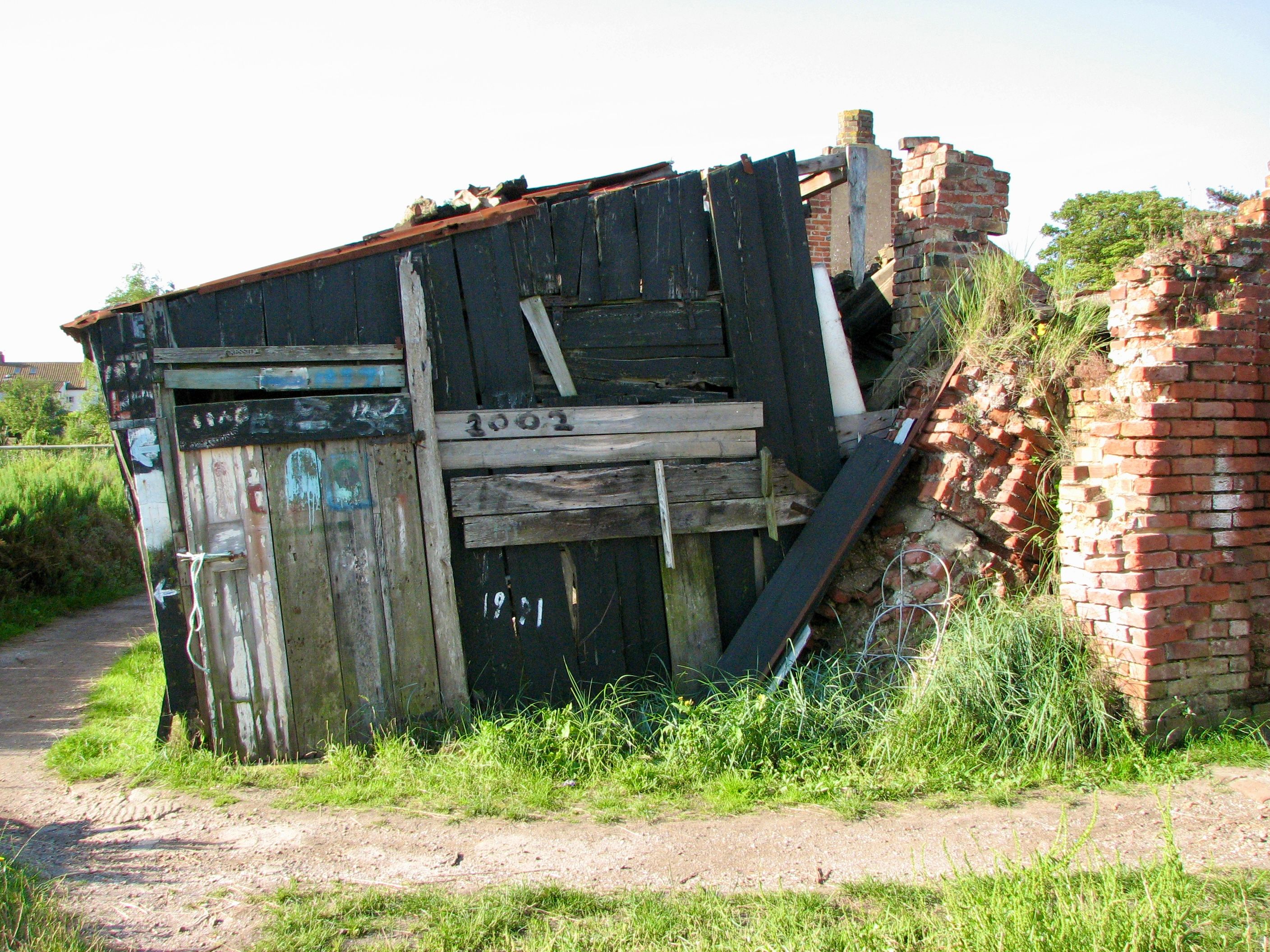 Rustic Abandoned Shack with Weathered Brick Walls · Free Stock Photo