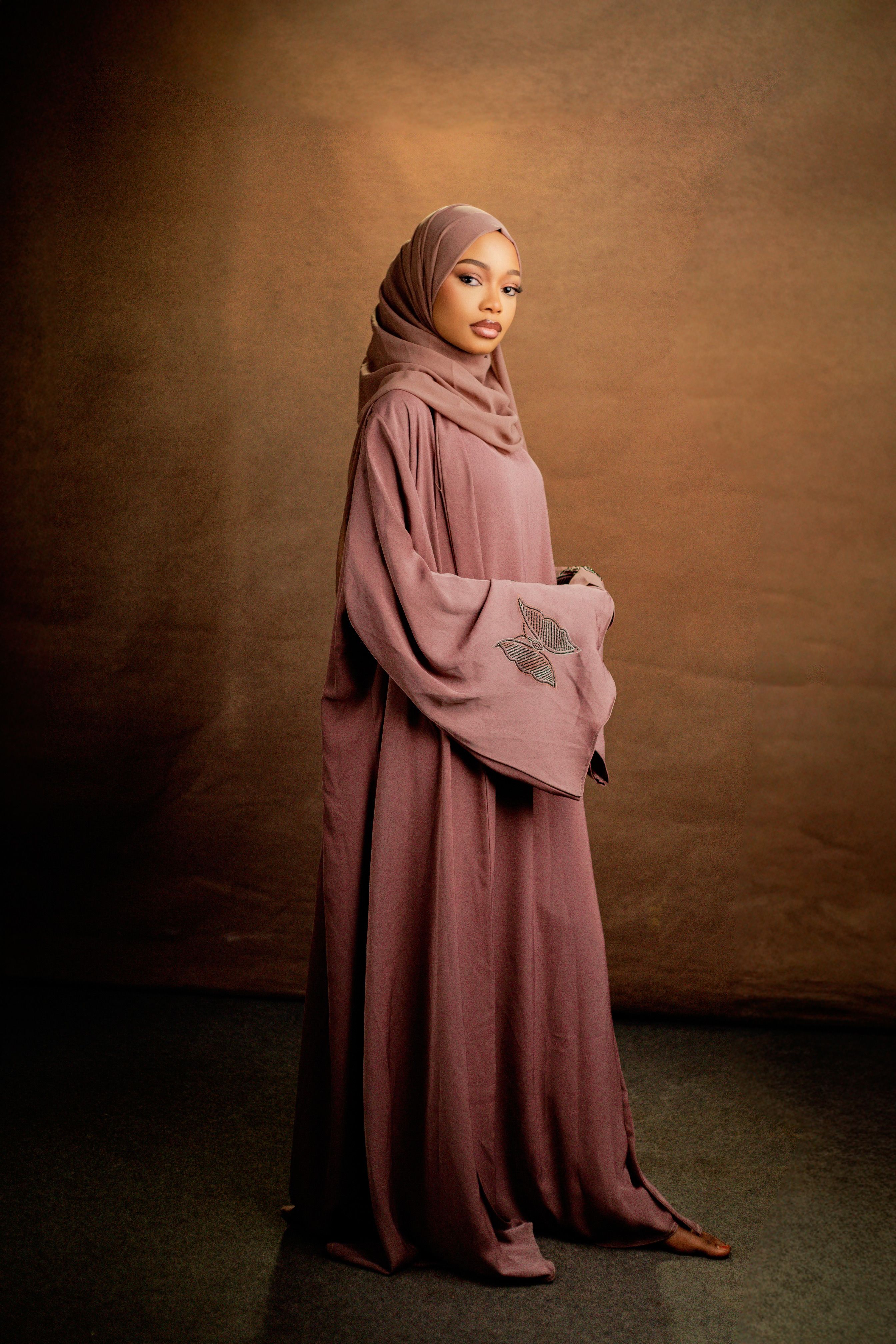 Elegant Woman in Traditional Hijab Portrait · Free Stock Photo