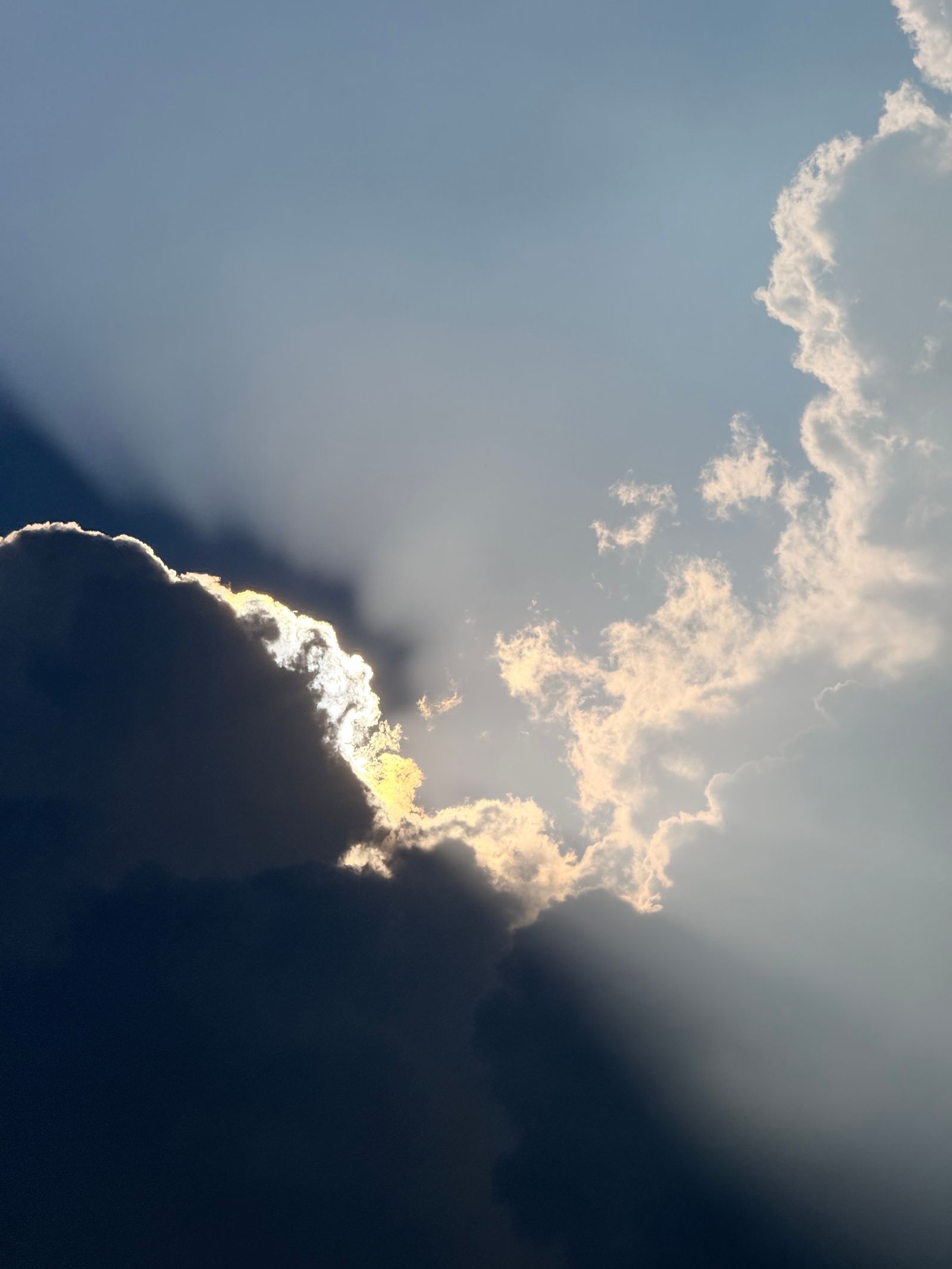Dramatic Sun Rays Breaking Through Storm Clouds · Free Stock Photo