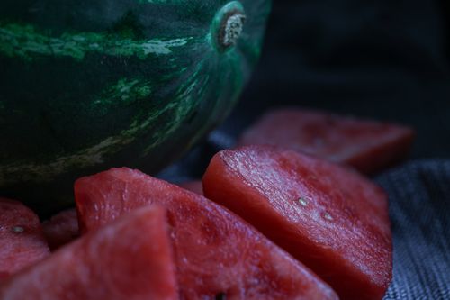 Free Detailed close-up of juicy watermelon slices, perfect for summer refreshment. Stock Photo