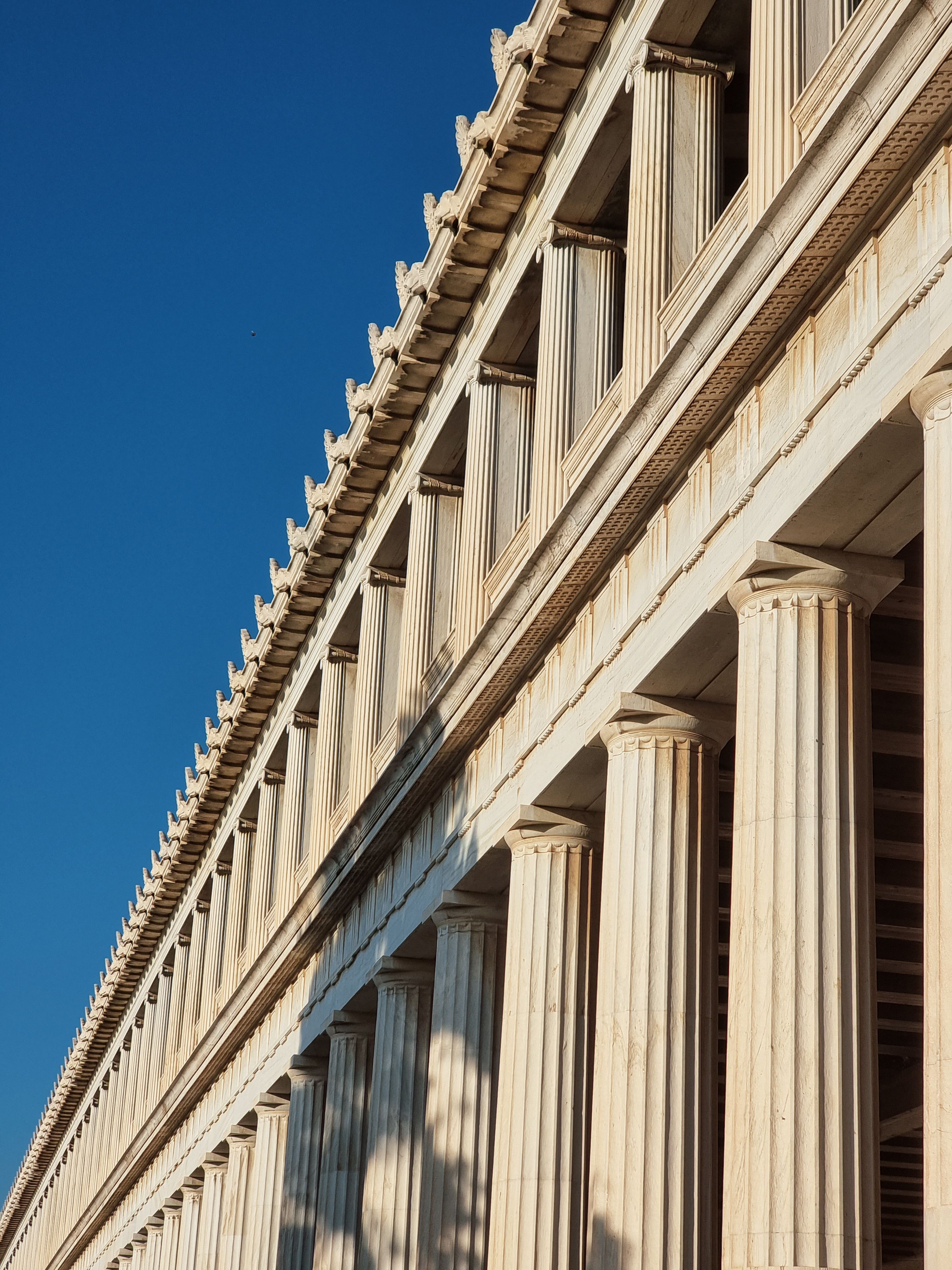 Ancient Greek Architecture Under Blue Sky · Free Stock Photo