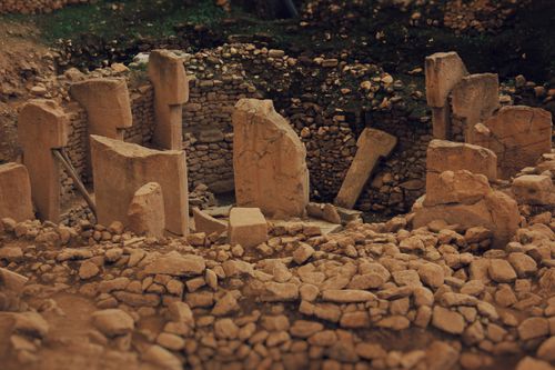 Free Explore the ancient stone pillars of Göbekli Tepe, an archaeological wonder in Şanlıurfa, Türkiye. Stock Photo