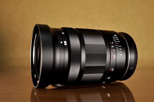 Free A detailed view of a camera lens showing focus and aperture settings, perfect for photography enthusiasts. Stock Photo