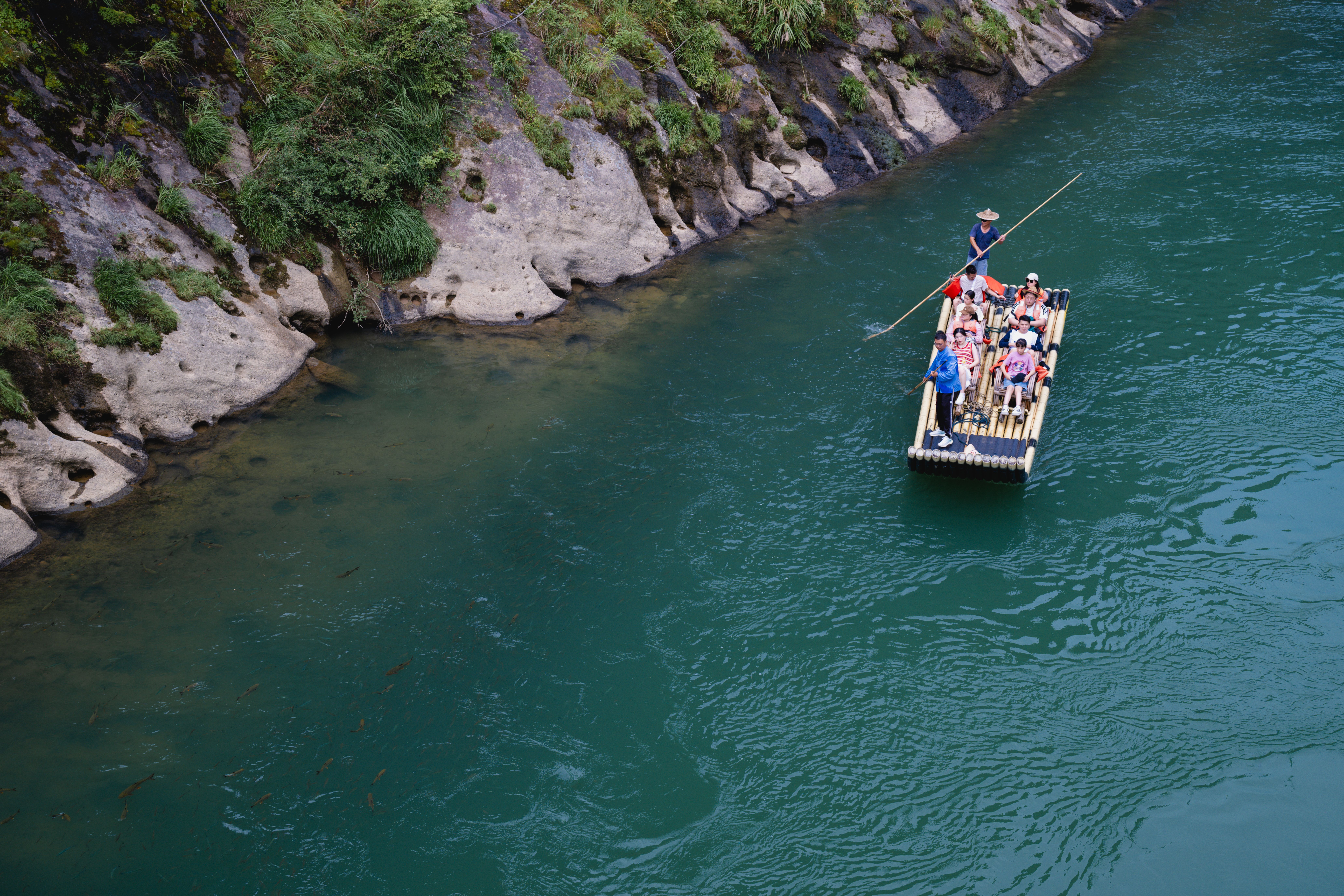 Peaceful Bamboo Raft Ride on Turquoise River · Free Stock Photo