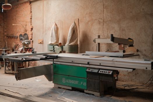 Cozy woodworking workshop featuring a professional Altendorf F45 sliding table saw.