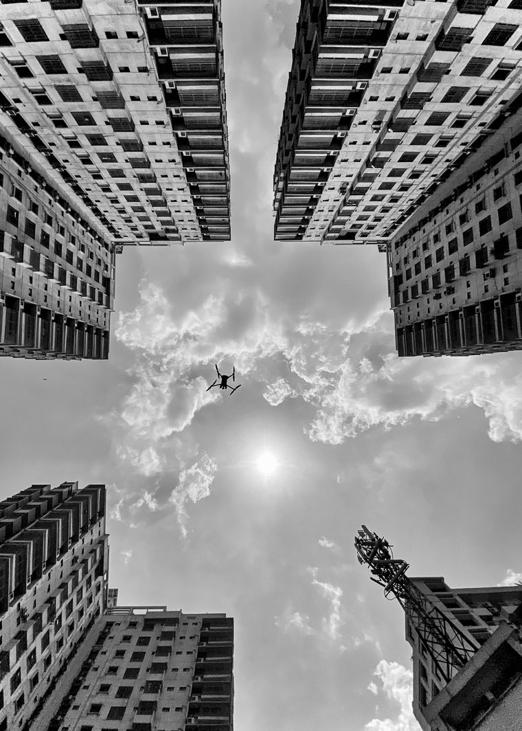 Drone flying near a high-rise building