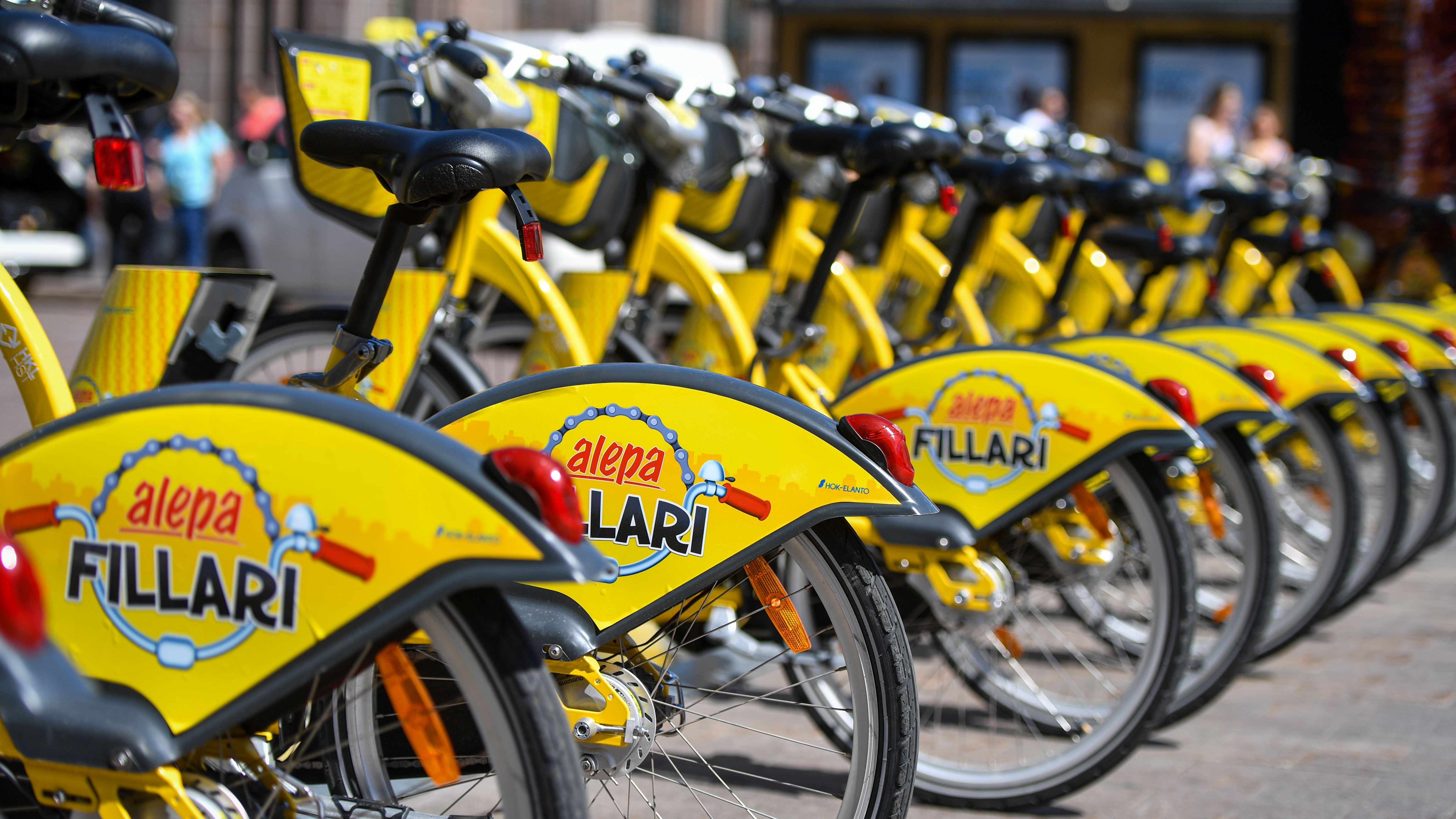 Yellow Alepa Fillari Bikes in Helsinki, Finland · Free Stock Photo