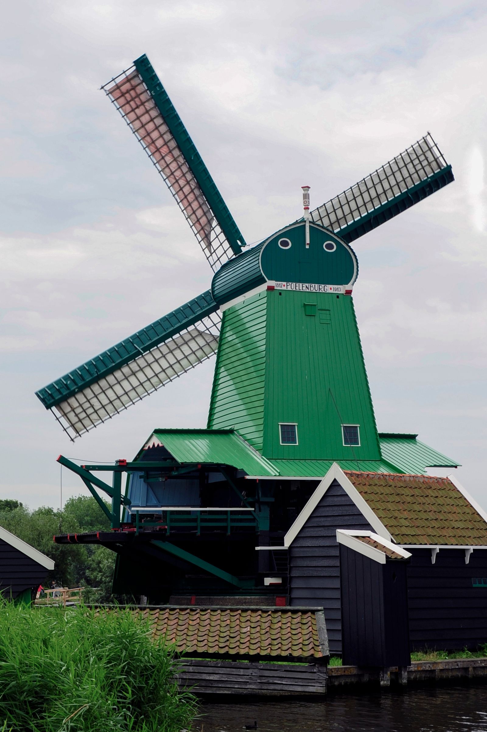 Zaanse Schans windmills Netherlands canal dark green